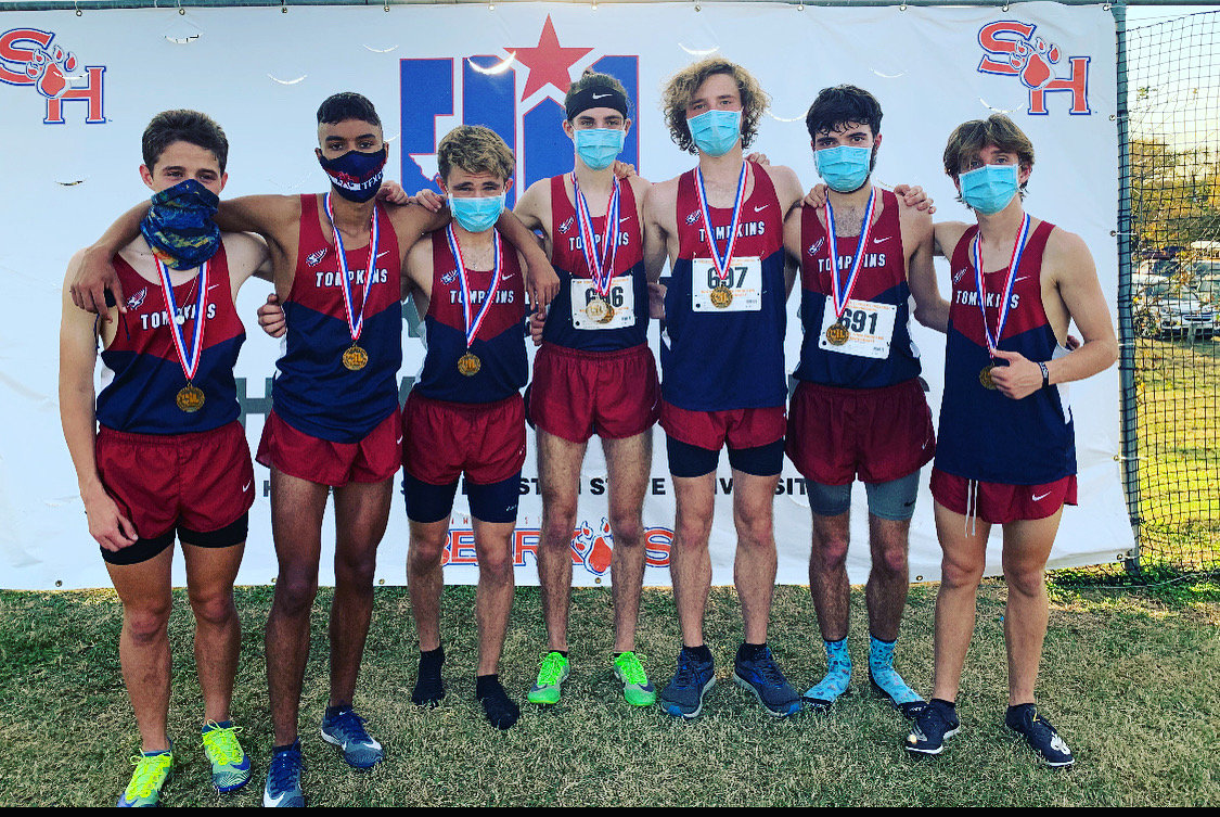 The Tompkins boys cross country team finished third at the Region III-6A meet in Huntsville on Tuesday to book its ticket to state.